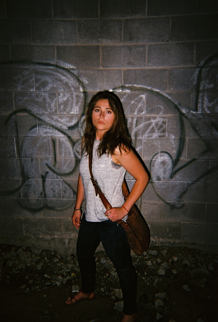 jes in an abandoned building with graffiti